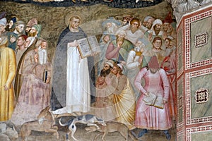 Saints Peter the Martyr and Thomas Aquinas Refute the Heretics, fresco in Santa Maria Novella church in Florence photo