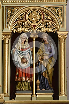 Saints Veronica and Mary Magdalene statues on the main altar in the church of St. Stephen the Protomartyr in Stefanje, Croatia