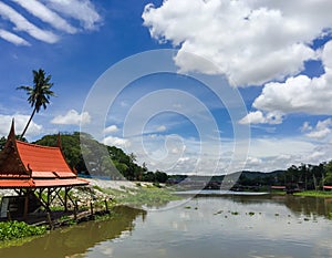 Sakae Krang Riverside On Blue Cloudy Sky Background In Uthai Thani Province, Thailand