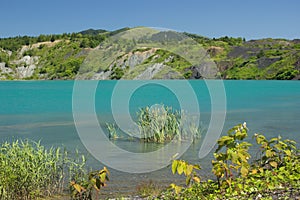 Sakhalin Island, Russia, Emerald water lake on a place of abandoned mine