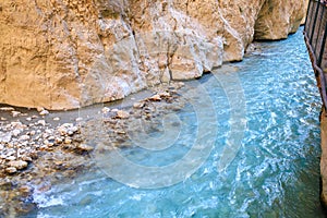 Saklikent Canyon in Turkey with mountain cold stormy water in the river. Natural attraction, popular place for tourists