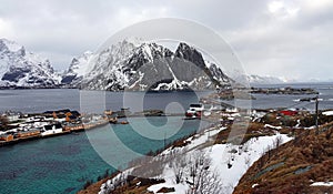 Sakrisoy and Hamnoya on Reinefjorden from mountain on the Lofoten in Norway in winter