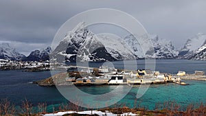 Sakrisoy island and Olstinden mountain at the Reinefjorden on the Lofoten in Norway in winter