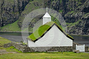 Saksun church rear view with lake in the background