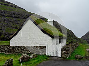 Saksun. Old white church with green grass roof