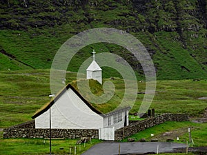 Saksun. Old white church with green grass roof