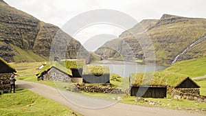 Saksun Village and beach in green landscape on the Faroe Islands in Denmark.