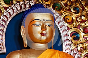 Sakyamuni Buddha statue in Buddhist temple photo