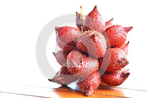Salacca Salak, snake fruit fruits grow in clusters, edible with acidic taste, with reddish-brown scaly skin covering white pulp