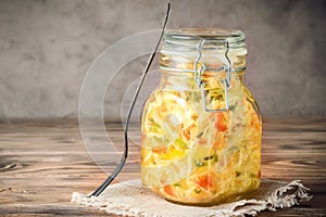 Salad appetizer of fermented vegetables sauerkraut carrots and peppers