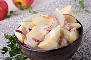 Salad with apples, red onions and oil