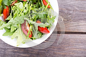 Salad arugula and cherry tomato