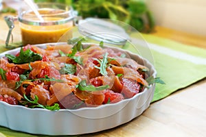 Salad with arugula, grapefruit and salmon, a fresh summer meal f