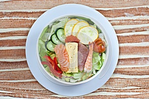 Salad with assorted sashimi