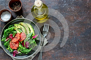 Salad with avocado and grapefruit. Healthy eating. Vegetarian food