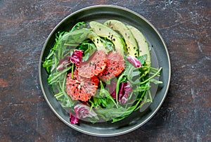 Salad with avocado and grapefruit. Healthy eating. Vegetarian food
