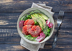 Salad with avocado and grapefruit. Healthy eating. Vegetarian food