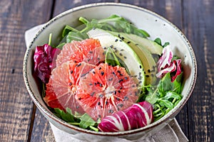 Salad with avocado and grapefruit. Healthy eating. Vegetarian food