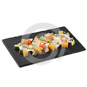 Salad with avocado and mango shrimps on a white background for the site2