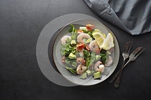 Salad with avocado and shrimps. Healthy fresh salad
