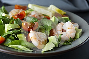 Salad with avocado and shrimps. Healthy fresh salad