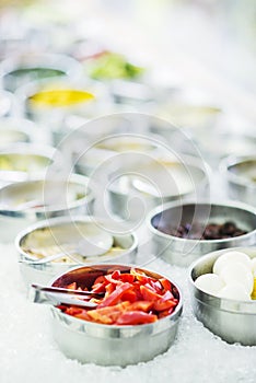 Salad bar buffet fresh mixed vegetables display