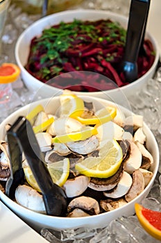 Salad bar with raw mushrooms