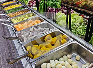 Salad bar with various fresh vegetables Sliced at supermarket. H