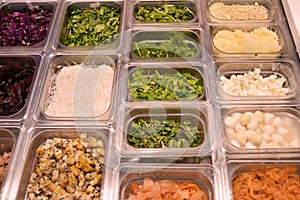 Salad bar with vegetables in the restaurant, healthy food.