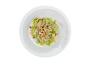 Salad with beans and asparagus on plate white isolated