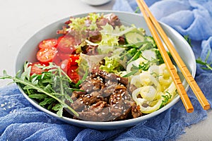 Salad with beef teriyaki and fresh vegetables