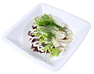 Salad of beets, lettuce, fish and eggs