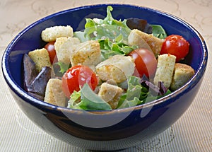 Salad in a blue bowl