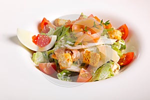 Salad Caesar with egg and caviar