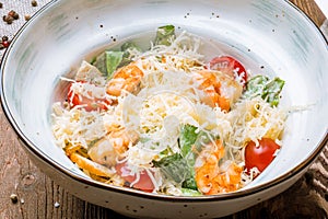 Salad caesar with shrimps