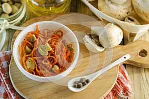 Salad and carrot with marinated mushrooms