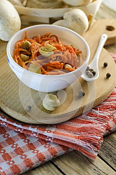 Salad and carrot with marinated mushrooms