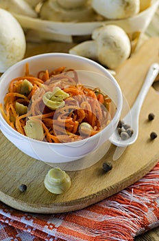 Salad and carrot with marinated mushrooms