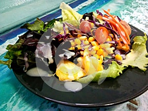 Salad of colorful fruits and vegetables