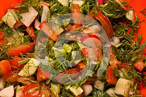Salad consists of tomatoes, parsley