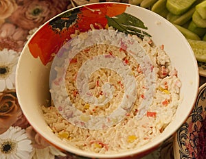 Salad of crab sticks, corn, rice and mayonnaise