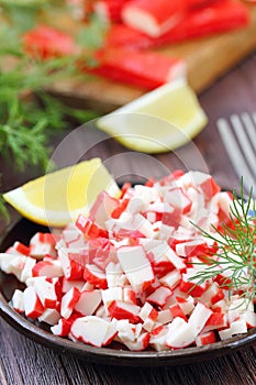 Salad with crab sticks prepared for eating