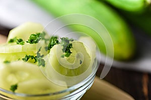 Salad of cucumber in glas bowl fresh food