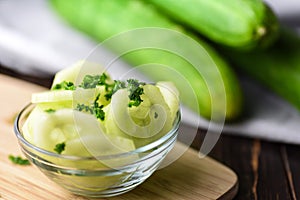 Salad of cucumber in glas bowl fresh food