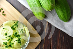 Salad of cucumber in glas bowl fresh food
