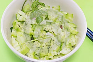 Salad with cucumber and marrow squash with parsley onion and ore