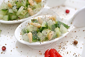 Salad of cucumber and pine seeds