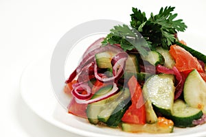 Salad with cucumber and tomatos