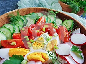 Salad cucumbers fresh , tomatoes diet , summer homemade antioxidant eggs dinner cuisine a wooden background
