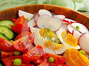 Salad cucumbers, tomatoes, summer  homemade   antioxidant  eggs dinner cuisine a wooden background